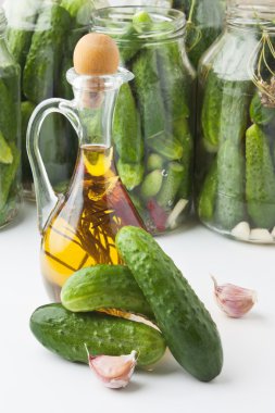 Harvesting and canning cucumbers clipart