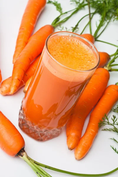 Carrots and carrot juice — Stock Photo, Image