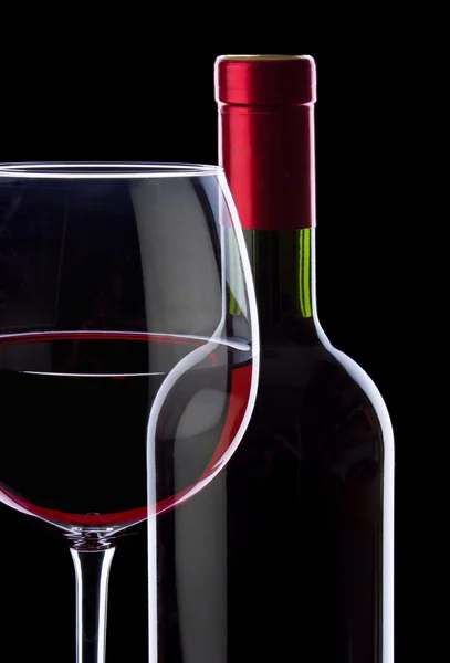 Rotwein im Glas und Flasche — Stockfoto