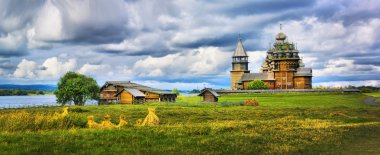 The wooden buildings of the ancient Russian architecture clipart