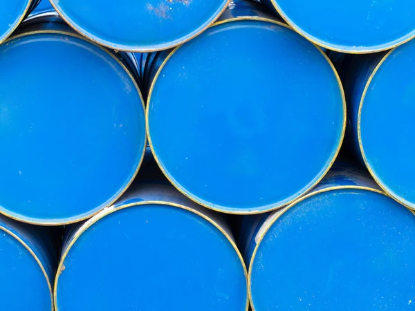 Stack of painted blue oil barrels — Stock Photo, Image