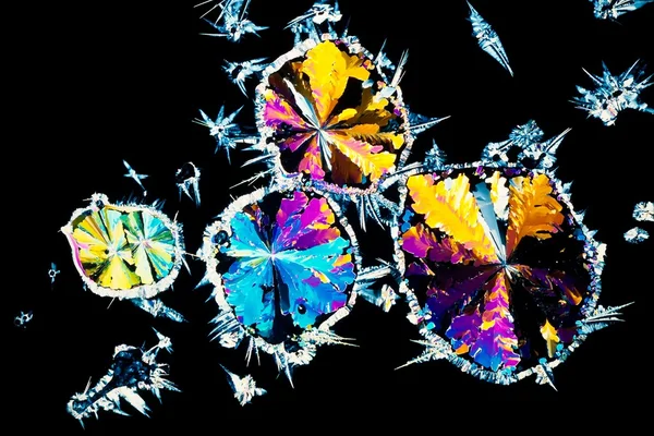 Citric acid crystals in polarized light — Stock Photo, Image