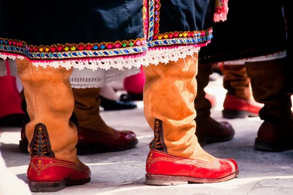stock image Traditional Greek cloths, dress and leather shoes