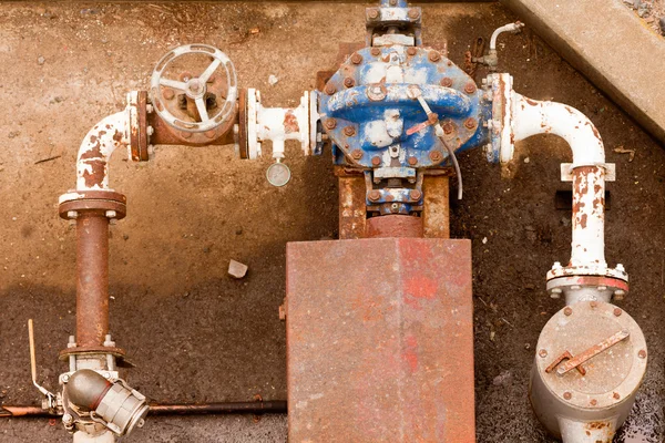 Rusty industrial water pump and attachments — Stock Photo, Image