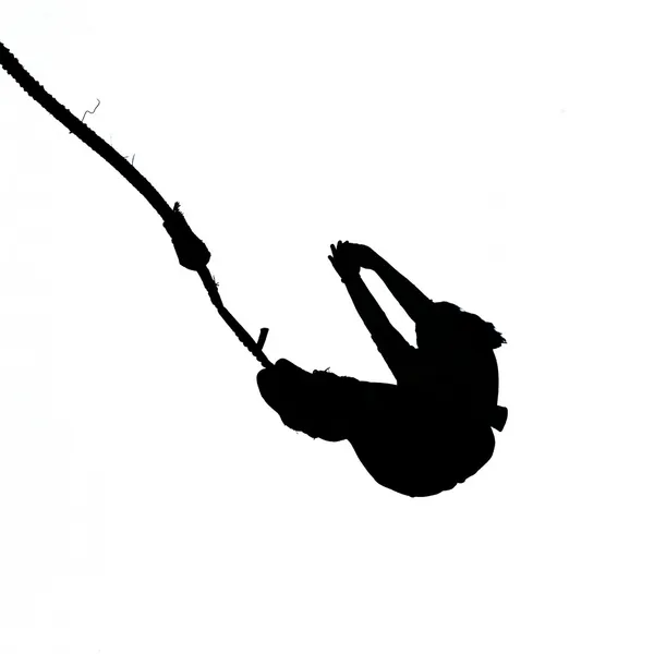 stock image Black silhouette of bungee jumper on white