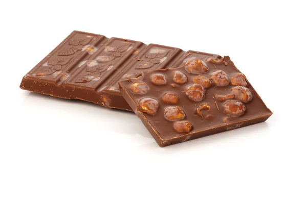 Broken chocolate bar witg peanuts — Stock Photo, Image