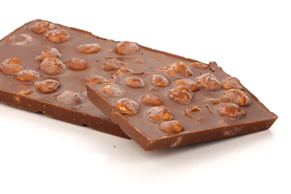 Broken chocolate bar witg peanuts — Stock Photo, Image