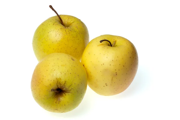 Drei gelbe Äpfel — Stockfoto