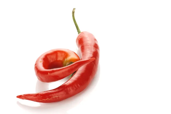 Два красных холодных перца — стоковое фото