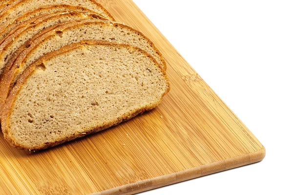Sliced bread on board — Stock Photo, Image
