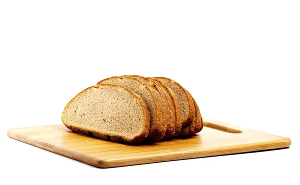 Sliced bread on board — Stock Photo, Image