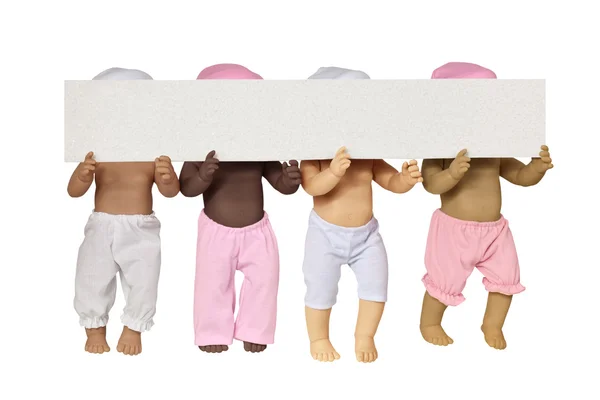 Gövde dört oyuncak bebek — Stok fotoğraf