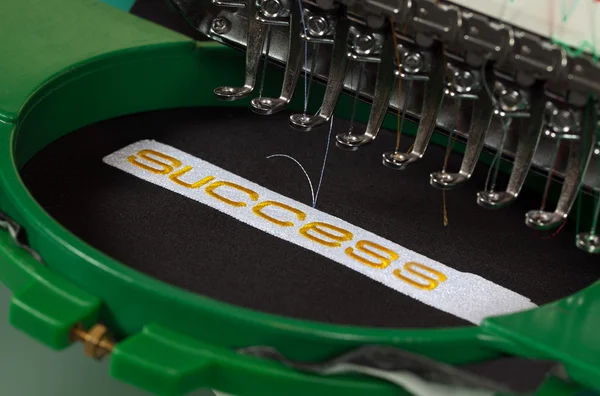 Success embroidery — Stock Photo, Image