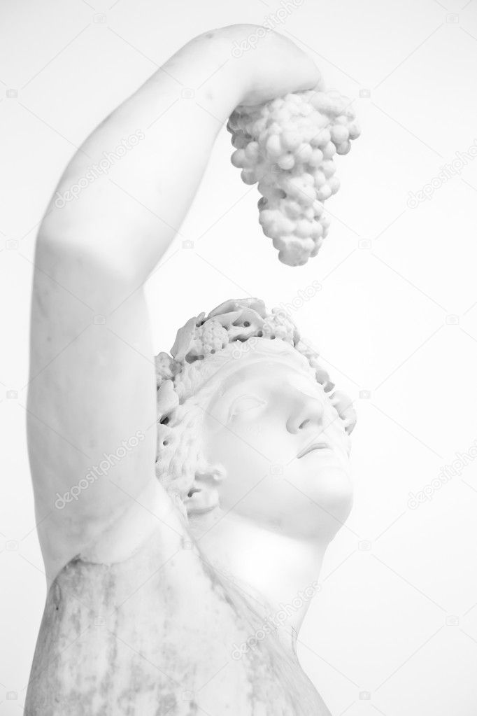 Statue with grapes