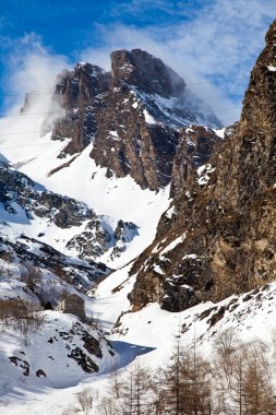 Sunny day on Alps clipart