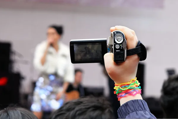 Hand recording the concert — Stock Photo, Image