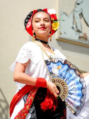 Mexican girl in traditional costume clipart