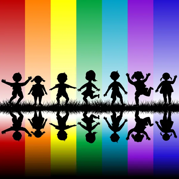 Kids playing over a rainbow background — Stock Photo, Image
