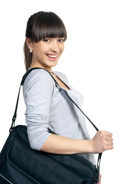 Krásná dívka bruneta s černou taškou — Stock fotografie