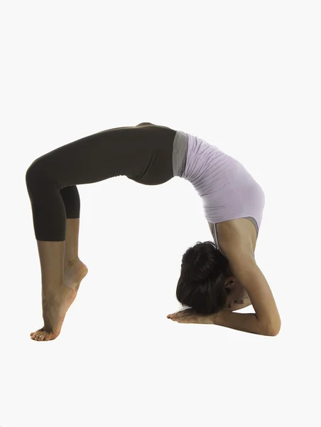 stock image Young woman doing yoga