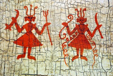 Dancing figures on an aged background. clipart