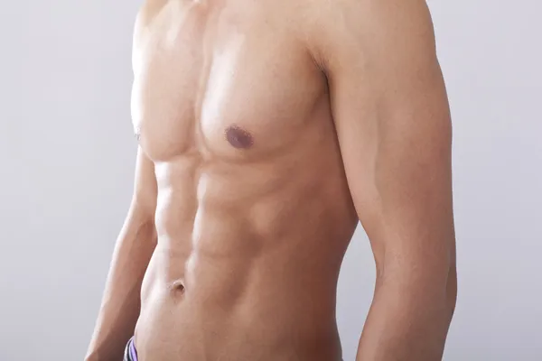 Чоловічі груди і м'язи — стокове фото
