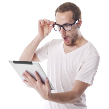 Surprised Nerd Man Looking at Tablet Computer clipart