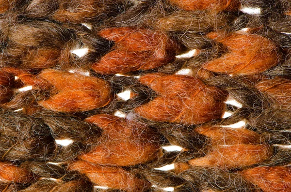 Оранжевая и зеленая вязаная шерсть — стоковое фото