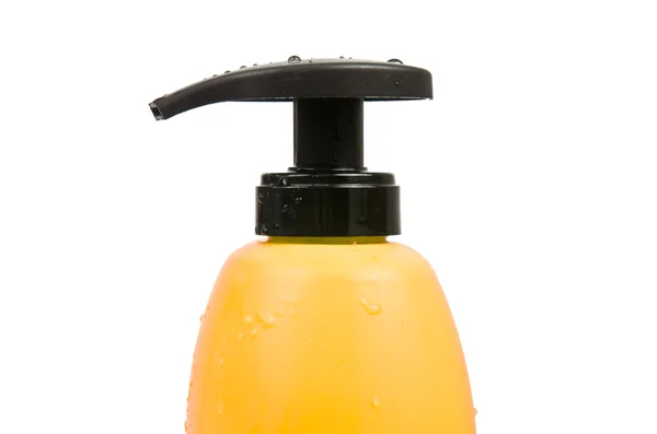 Close up van gele shampoo fles dop — Stockfoto