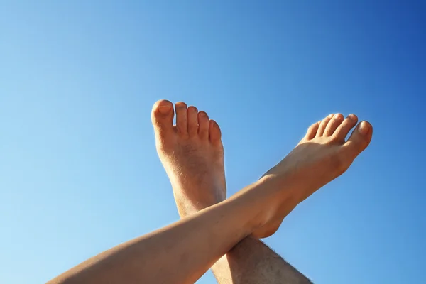 Male and female foot — Stock Photo, Image