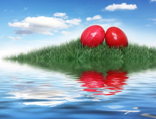 Red Easter eggs on a small hill — Stock Photo, Image