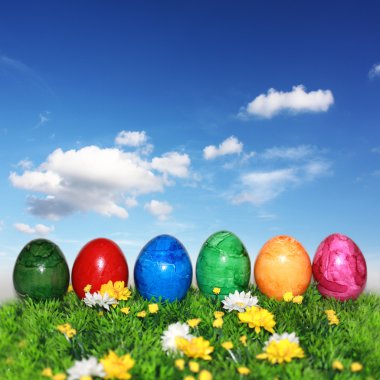 Happy Easter on a blue background clipart