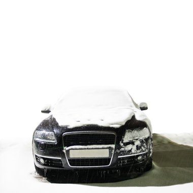 Black car on the winter road clipart