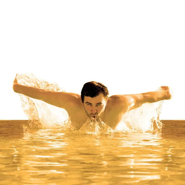 Man simmar fjäril i pool — Stockfoto