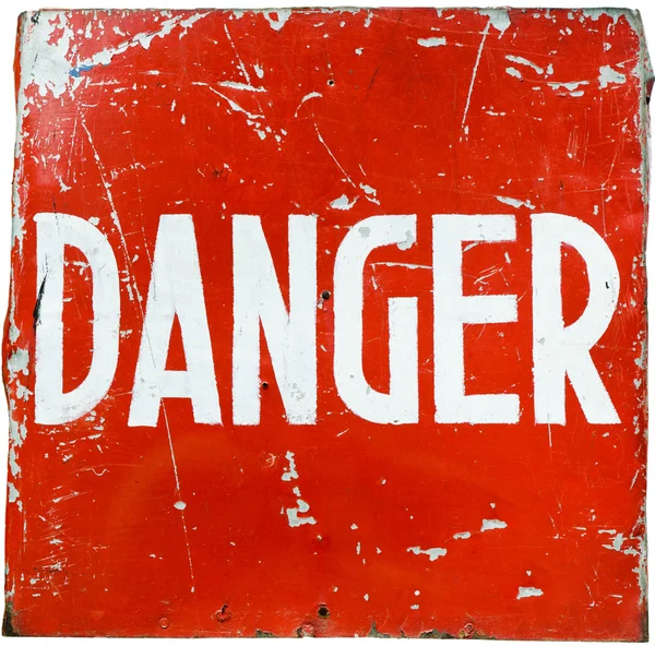 Palavra "perigo" em um escudo vermelho — Fotografia de Stock