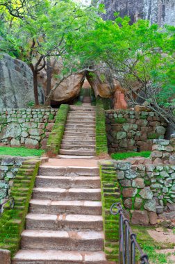 Steps and the ruins of the royal palace and the park of Sigiriya clipart