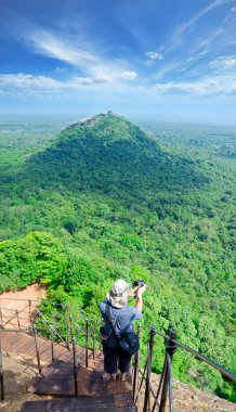 View from mount Sigiriya, Sri Lanka (Ceylon) with tourist on sho clipart