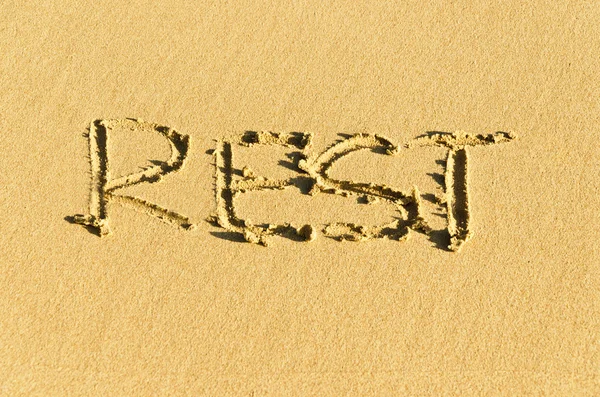 Inscriptie op het zand — Stockfoto