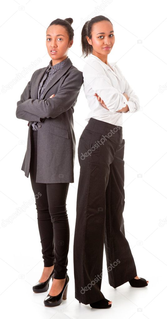 Two business women in casual poses