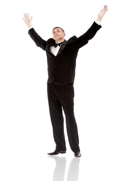 Елегантний чоловік у класичному смокінгу на білому тлі — стокове фото