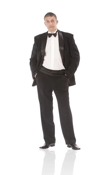 Elegancki mężczyzna w klasycznego smokingu na białym tle — Zdjęcie stockowe