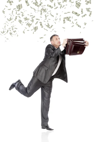 The businessman catches flying happiness — Stock Photo, Image