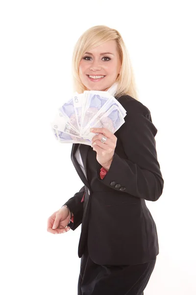 Woman holding piggy bank with a plaster — Stock Photo, Image
