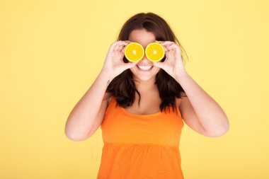 Woman Having Fun With Oranges clipart