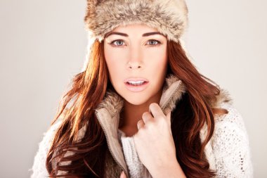 Gorgeous Redhead Fashion Model In Winter Fur clipart