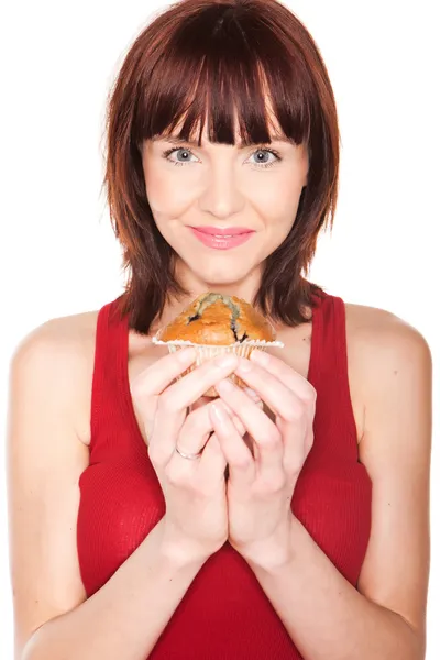 Frau mit großem Muffin — Stockfoto