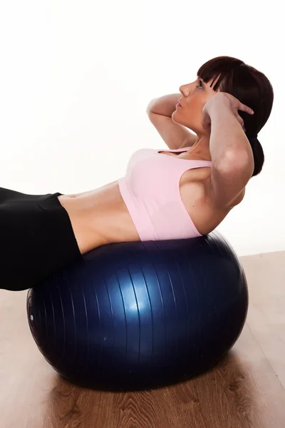Mulher fazendo Pilates Treinamento — Fotografia de Stock