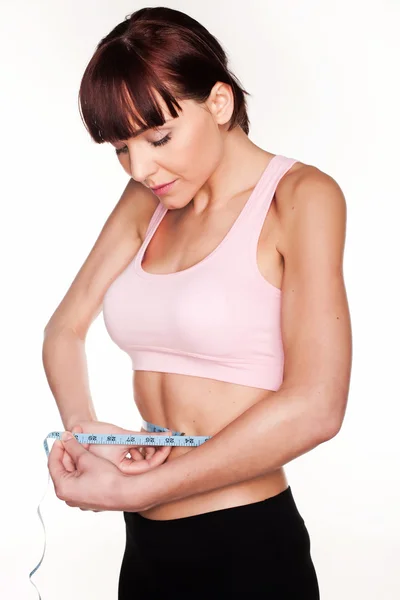 Mulher verificando seu peso perda — Fotografia de Stock