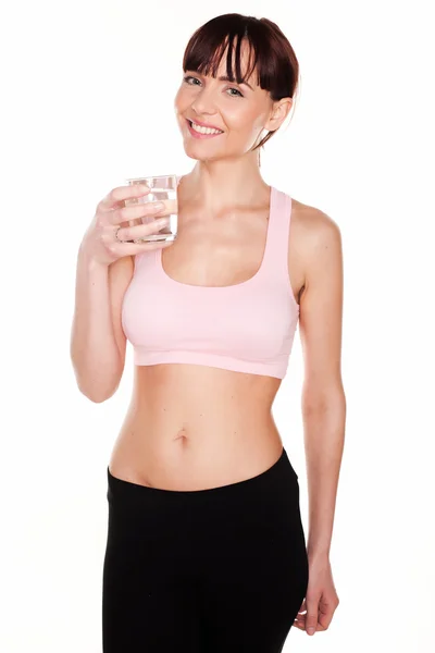 Sportvrouw met gezonde glas water — Stockfoto