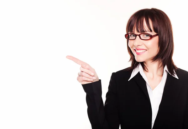 Mujer de negocios sonriente señalando — Foto de Stock